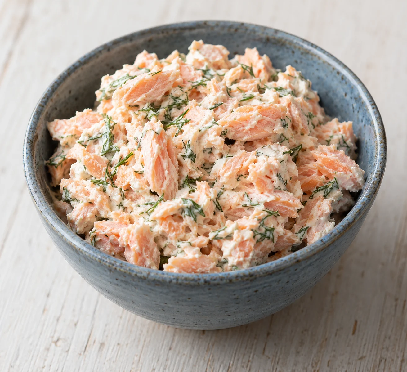 Flaked freshly baked salmon folded with plain cream cheese, lemon and dill into a chilled textured spread.