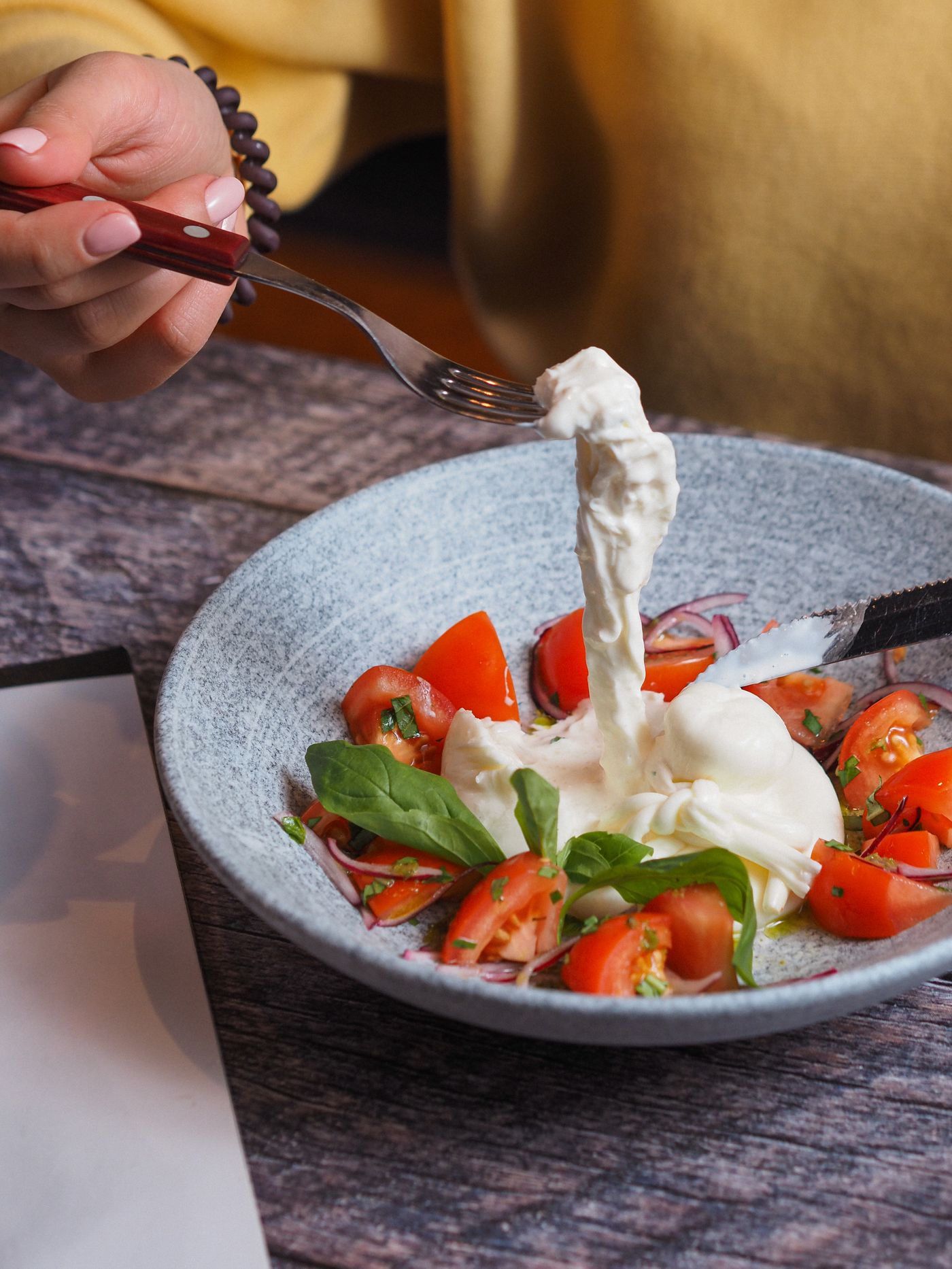 Burrata & cherry tomato salad; cherry tomatoes, whole soft white burrata-style cheese, fresh basil, olive oil or dressing