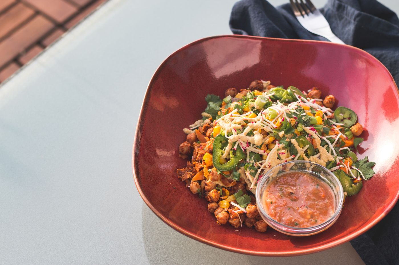 Spicy chickpea & corn salsa bowl; browned chickpeas, sweetcorn, sliced jalapeno, fresh cilantro