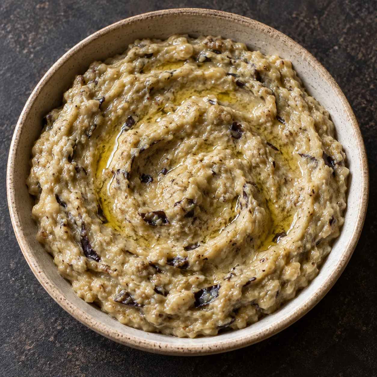 A rustic skin-on roasted eggplant spread blended with sesame tahini, lemon and cumin.